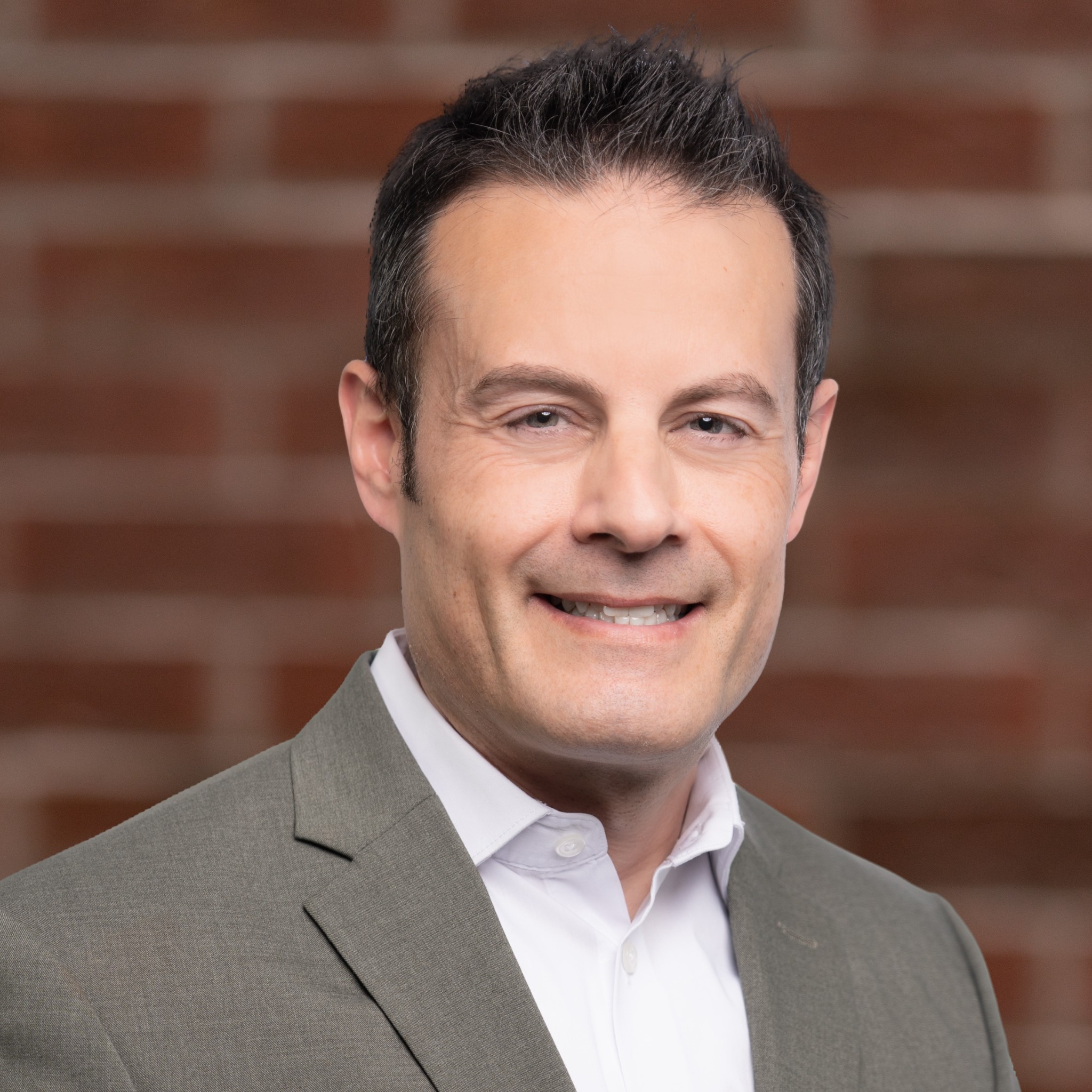Professional portrait of CX Built Better founder Eli Federman